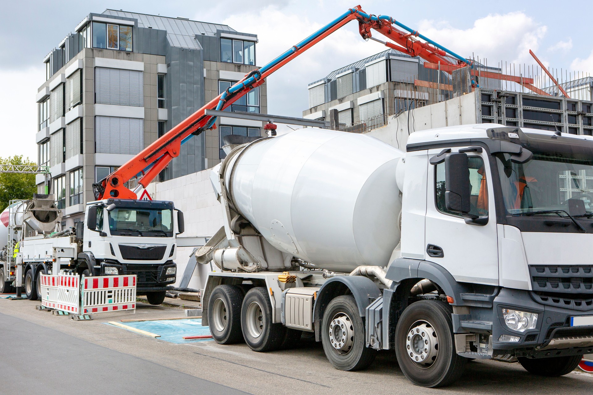 Large construction site, cement truck and equipment